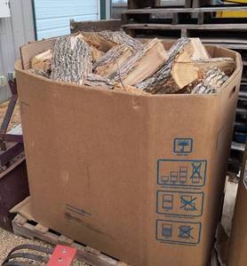 Pallet  gaylord box full of split firewood