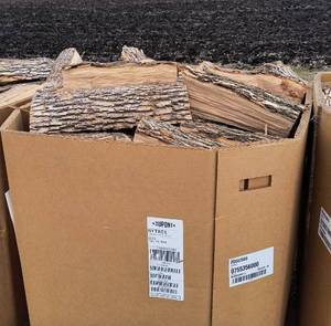 Pallet  gaylord box full of split firewood