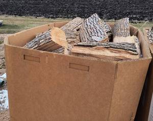 Pallet  gaylord box full of split firewood