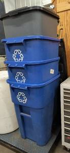 top grey garbage can and top blue one both with flip top lids