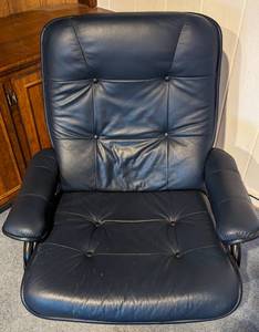 lot 25 image: Navy Blue Leather Armchair and Ottoman