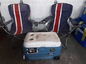 lot 23 image: 2 folding camp chairs and a cooler