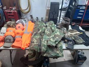 lot 53 image: hunting clothes, hats, boots