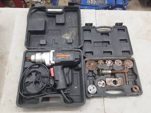 lot 9 image: 12 electric impact and brake caliper compressor tool