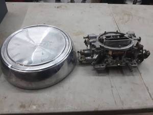 lot 10 image: edelbrock carburetor, ford hub cap