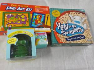 lot 8 image: New Sand Art Kit, YETI in my Spaghetti, Crocodile Dentist, and Squishums
