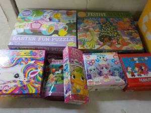 lot 57 image: 7 New Puzzles...