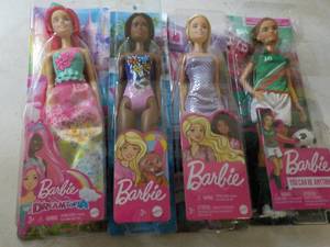 lot 67 image: 4 New Barbie Dolls...