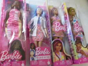 lot 68 image: 4 New Barbie Dolls...