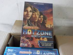 lot 77 image: 6 New Matt Leacock Pandemic Hot Zone North America Games