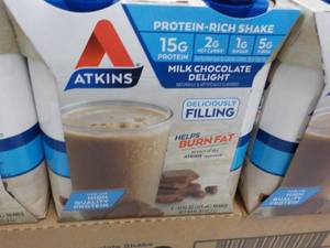 lot 153 image: 12 x 11 oz Atkins Protein Rich Milk Chocolate Delight Shakes best date 112023