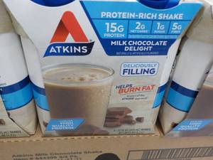 lot 154 image: 12 x 11 oz Atkins Protein Rich Milk Chocolate Delight Shakes best date 112023