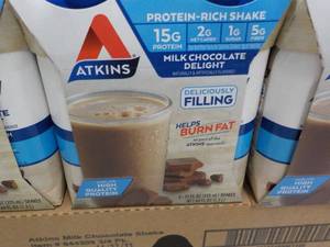 lot 155 image: 12 x 11 oz Atkins Protein Rich Milk Chocolate Delight Shakes best date 112023