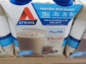 lot 156 image: 12 x 11 oz Atkins Protein Rich Milk Chocolate Delight Shakes best date 112023