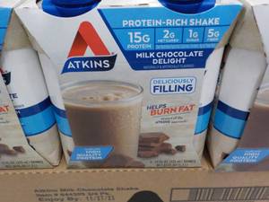 lot 157 image: 12 x 11 oz Atkins Protein Rich Milk Chocolate Delight Shakes best date 112023