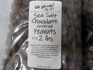 lot 196 image: 2 x 2 lb. Bags Sea Salt Chocolate Covered Peanuts Best By 05022024