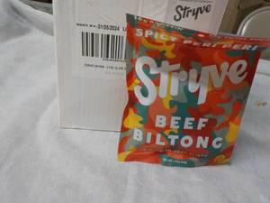 lot 276 image: 12 x 2.25oz bags Stryve Beef Biltong Air- dried beef slices best date 010524
