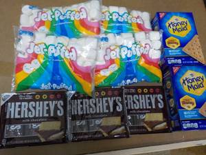 lot 305 image: 2 Boxes Honey Maid Graham Crackers, 4 bags Jet Puffed Marshmallows and 4 - 6 packs Full Size Candy Bars