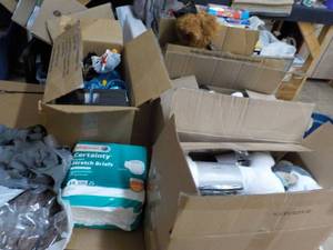 lot 334 image: 4 boxes Unclaimed Merchandise- see all pictures