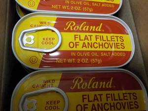 lot 102 image: 4 x 25 x 2 oz Tins Roland Flat Anchovy Fillets in Olive Oil past best date