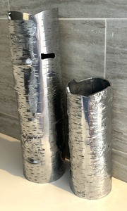 lot 67 image: Pair of Michael Arams Raw Edge Rustic Aluminum Vases