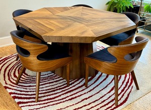 lot 1 image: Octagon Yukas Wood Dining Table and Seven Walnut and Canvas Chairs