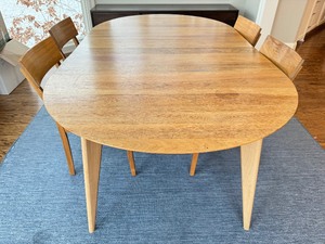lot 8 image: Room and Board Wooden Dining Table and Four Chairs