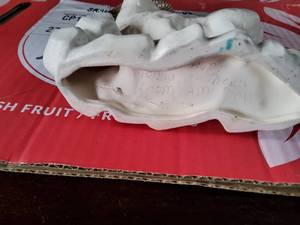 Porcelain ram figurine.
