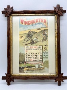 lot 8 image: Vintage 1960 Winchester Guns Framed Calendar