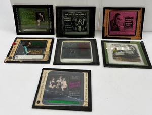 lot 24 image: Antique Magic Lantern Advertising Slides - QTY 7