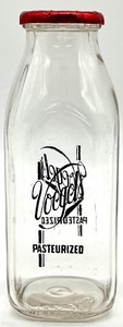 lot 142 image: 3 Vintage VOEGELS PASTEURIZED Milk Bottles with Cream Top Spoon & Dairy Coupon Book #4502C from the 1920s
