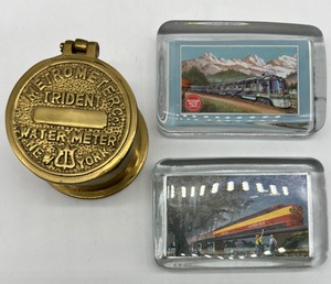 lot 275 image: Northern Pacific & Missouri Pacific Lines RAILROAD Glass Paperweights and Brass Metrometer Trident Water Meter Covered Dish