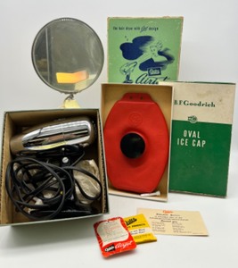 lot 274 image: Vintage Lighted Vanity Mirror, NOS Oster AirJet Hair Dryer and B F Goodrich Oval Ice Cap