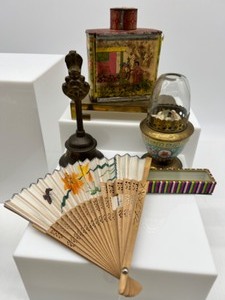 lot 288 image: RARE Antique TACK KEE Tin, Asian Oil Lamp, Asian Fan, Brass Display Stand and Cobra Bell
