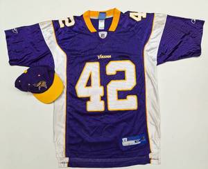 lot 604 image: Vikings NFL #42 Sharper Jersey - Used - Size M  Vikings NFL Cap - NWT