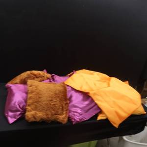 7 FUZZY THROW PILLOWS