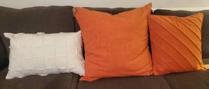 lot 54 image: 3 AVASA & LOVESAC Oranges & Whites Pillow Covers NWT