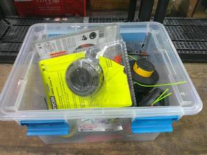 Bin of Replacement Ryobi Weed Whip Head and Line