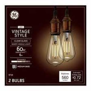 lot 156 image: GE 2pk 6W 60W Equivalent LED Light Bulbs Clear Glass Warm Candle Light
