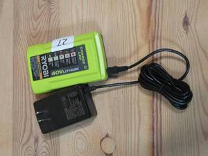 lot 221 image: Ryobi OP404VNM 40V Lithium Ion Battery Charger