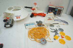 lot 20 image: Vintage Man in space toys