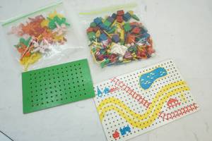 lot 140 image: Vintage Peg Board and Sticks, Plastic Clowns