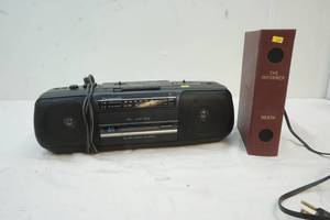 lot 77 image: Panasonic AMFM Cassette Player and Heath Ultrasonic Alarm Bookcase Model