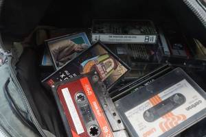 lot 128 image: Variety of Cassette Tapes with Carrying Case