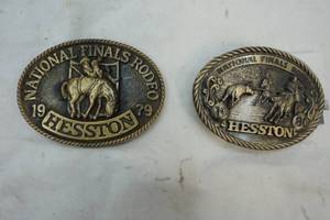 lot 321 image: 1979 & 1980 Hesston Nationals Final Rodeo Buckle