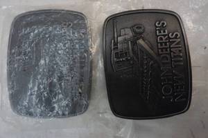 lot 323 image: John Deere Buckles