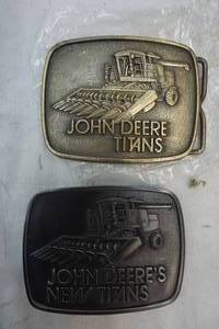lot 326 image: John Deere Buckles