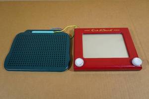 lot 196 image: Etch A Sketch and Chuckle & Roar Magnetic Drawing Board
