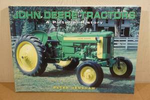 lot 265 image: John Deere Tractors A Pictorial History Book By Peter Henshaw