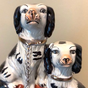 lot 28 image: Staffordshire Dogs with Barrel Figurine